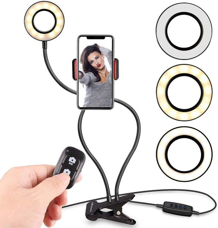 Das UNIQ Selfie Ring Light verfügt über eine einstellbare LED-Helligkeit, flexible Arme, eine Fernbedienung, eine aufsteckbare Basis und Kabelsteuerungen – ideal für Streaming, Vlogs, YouTube oder Make-up – mit drei Farbmodi: weiß, warm und neutral.