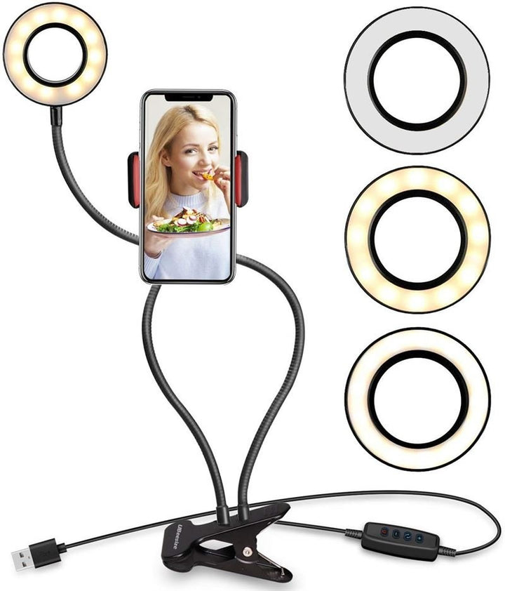 Das UNIQ Selfie-Ringlicht mit LED-Helligkeitsregelung verfügt über flexible Arme, einen USB-Stecker und einen Steuerschalter. Perfekt für Streaming, Vlogs, YouTube oder Make-up mit drei Lichttönen – warm, neutral und kühl – für verwacklungsfreie Aufnahmen.