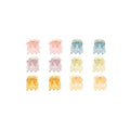 Die SOHO Lucca Mini Hair Claws – Glitter sind in Pastelltönen erhältlich – Rosa, Lila, Gelb, Grün und Blau – und in Reihen angeordnet. Diese zarten SOHO-Clips verleihen jeder Frisur einen charmanten Hauch von Glanz.