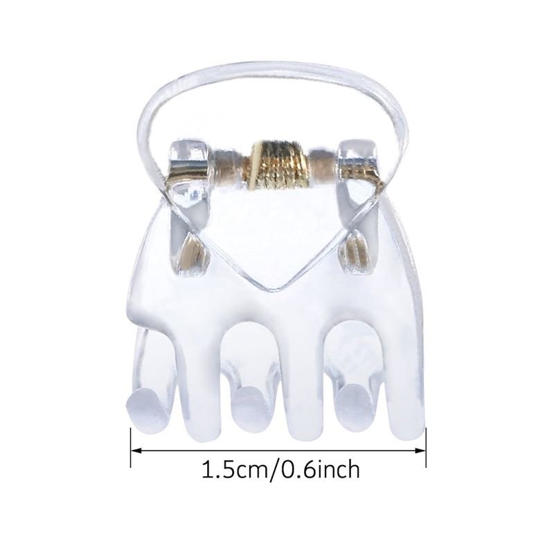 Die SOHO Lucca Mini Hair Claws – Transparent von SOHO verfügen über fünf abgerundete Zinken, eine goldfarbene Feder und sind nur 1,5 cm breit – perfekt für Fans von Mini- oder transparenten Haarspangen.