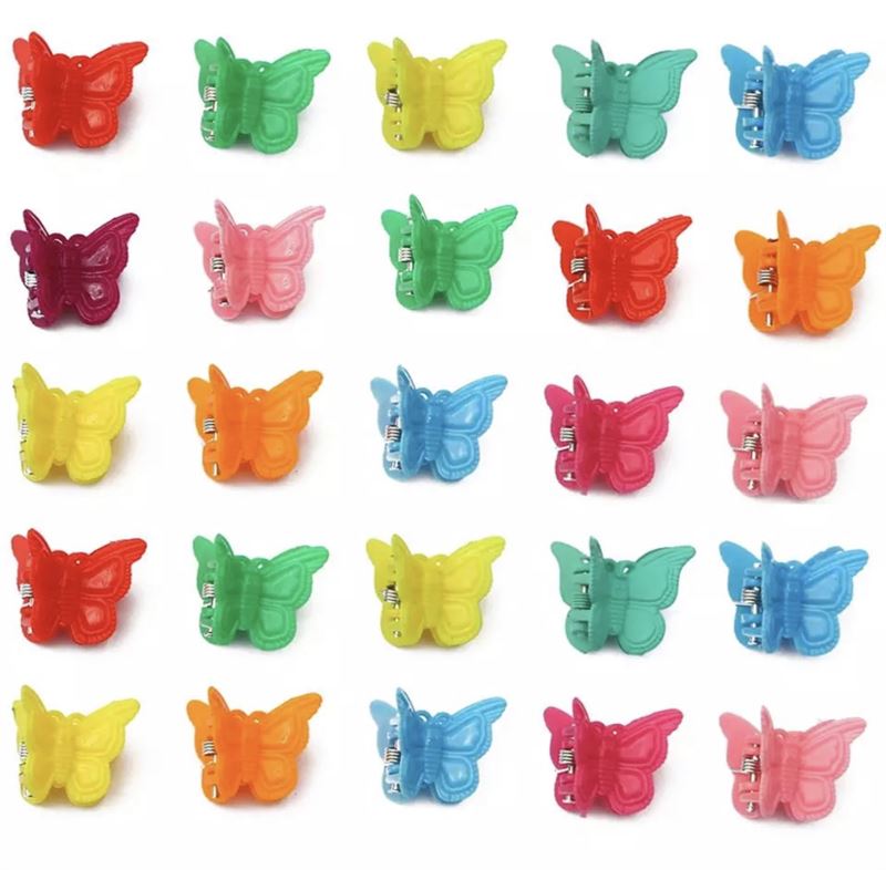The SOHO Mini Butterfly Hair Claws set includes 50 multicolour clips—yellow, pink, red, orange, green, and blue—ideal as vibrant hair accessories for decorating with a stylish grid of colorful butterflies.