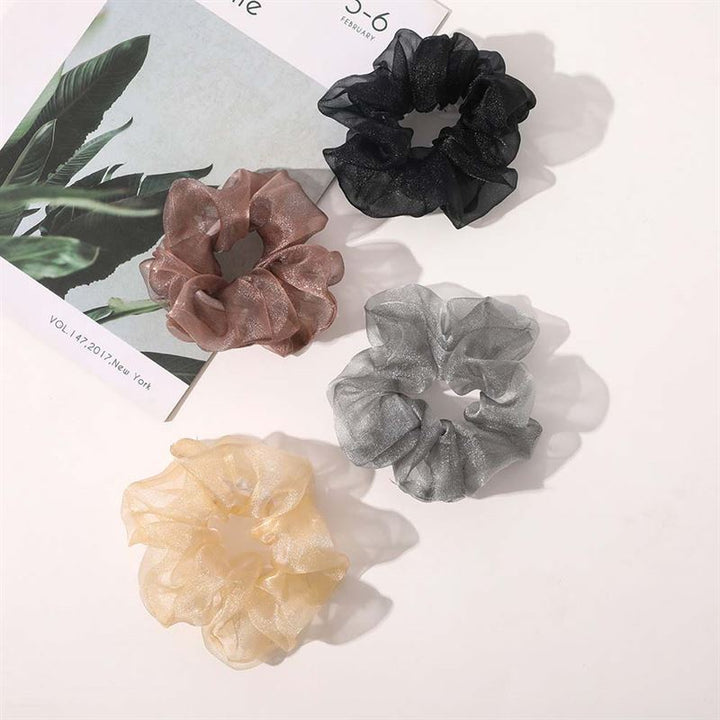 SOHO Solar Scrunchie – Schwarz – Haaraccessoires