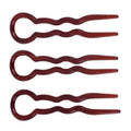 Das 3er-Pack SOHO Twist Chignon Hairpins enthält braune, gewellte Haarnadeln mit runden Griffen auf weißem Hintergrund – ideal, um Ihren Lieblings-Chignon oder Ihre Lieblings-Hochsteckfrisur zu fixieren.