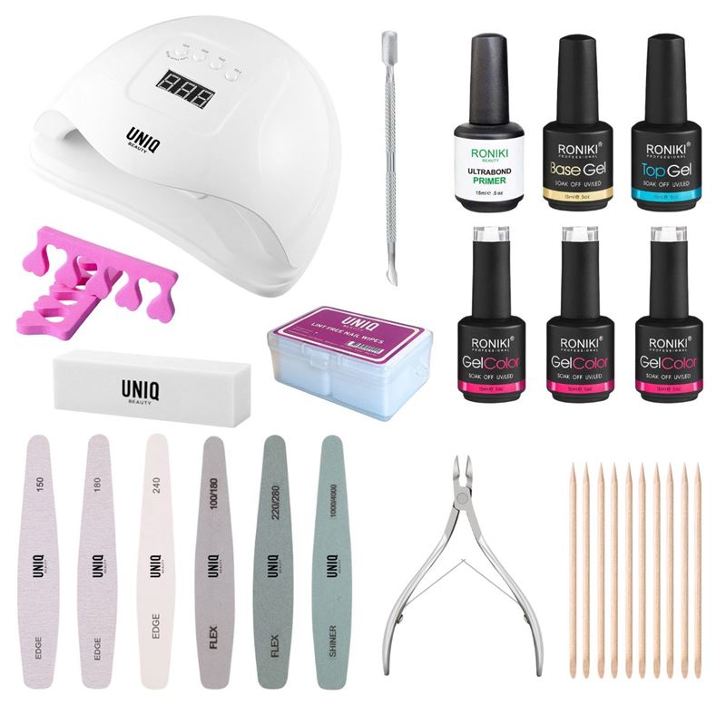Das UNIQ Premium Gel Polish Starter Kit von UNIQ enthält eine UV/LED-Lampe, Gel-Nagellacke, Feilen, Polierer, Zehentrenner, Nagelhautschieber, Nagelknipser, Orangenholzstäbchen und eine Aufbewahrungsbox – alles auf weißem Hintergrund dargestellt. Gel-Nagellack zu Hause herstellen!
